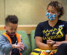 Mother and son in hospital waiting room